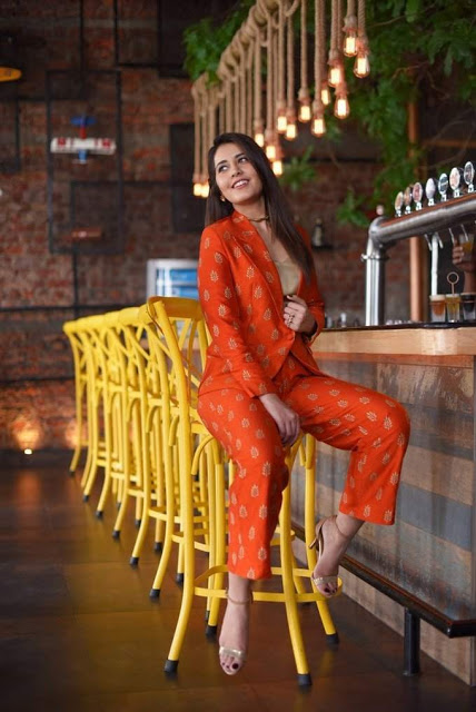 Raashi Khanna latest Photo Shoot In Long Hair Orange Dress 3